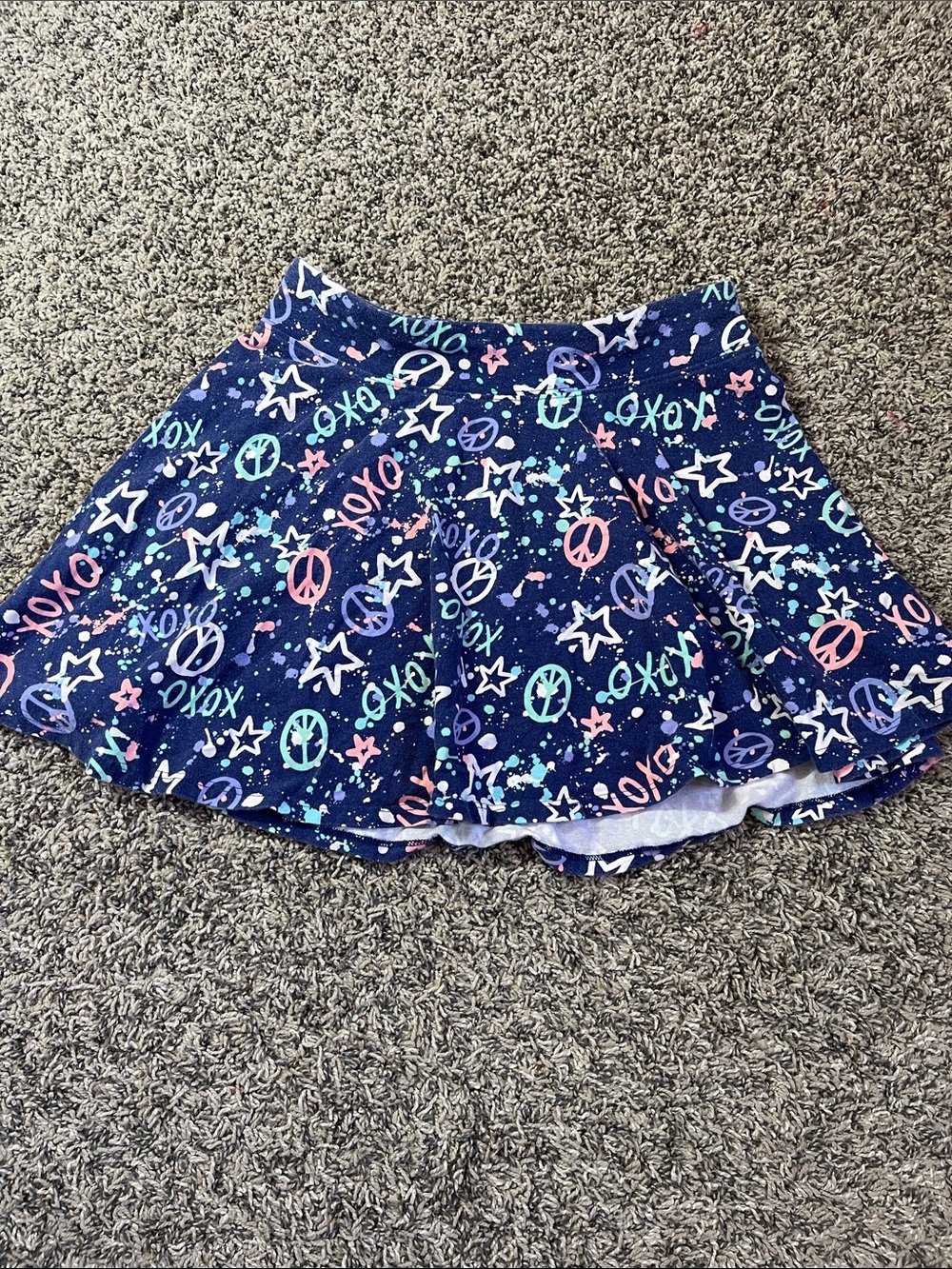 Girls skirt size 14 XOXO stars peace sign Blue skirt purple pink white green